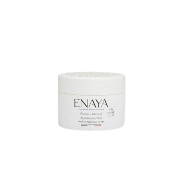 Un pot blanc étiqueté « Emulsion miracle revitalisante nuit -ENAYA -40ml » est placé au centre d'un fond uni, mettant en valeur ce soin de nuit avec un couvercle rond qui complète son design élégant.