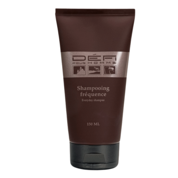 Un tube brun de 150 ml de Shampooing Fréquence Cheveux et Corps-Défi pour Homme, conçu pour un usage quotidien, est doté d'un bouchon à rabat et d'un texte argenté avec des icônes sur l'emballage.