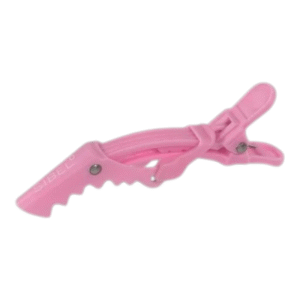 La Pince de séparation- Gator X3 -rose -Sibel est une pince à sectionner en plastique rose avec une poignée incurvée et dentée et une charnière à ressort, idéale pour maintenir les cheveux en place pendant le coiffage ou la coupe.
