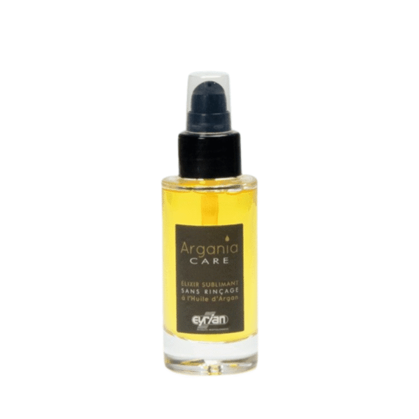 Un petit flacon transparent de 50 ml d'Elixir Sublimant-Argania Care-Eyrian avec un liquide jaune et un distributeur à pompe noir, étiqueté en français comme « soin cheveux sublimant huile d'argan Eyrian », est présenté sur un fond blanc.