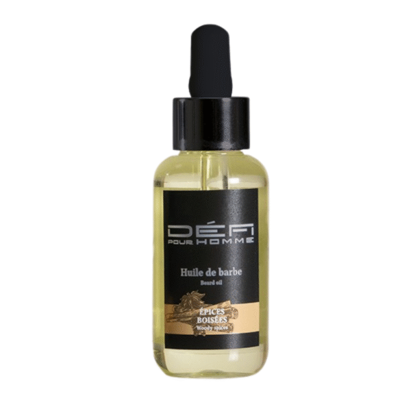 Un flacon transparent d'Huile de barbe parfumée-Epices Boisées-Défi Pour homme 50 ml avec un bouchon compte-gouttes noir et une étiquette noire indiquant « Huile de barbe, Epices Boisées, épices boisées.