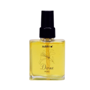 Un flacon en verre transparent d'huile jaune étiqueté « Divine huile Complexe illuminant-Sublimo-50ml » avec un motif floral noir et un bouchon vaporisateur est présenté sur un fond blanc.