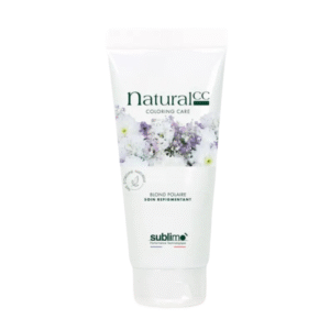 Un tube blanc de Perfecteur Déjaunisseur Repigmentant - Natural CC - 100 ml présente un design floral et un texte vert, offrant un soin capillaire blond radieux et aux tons froids étiqueté « Blond Polaire Soin Repigmentant ».