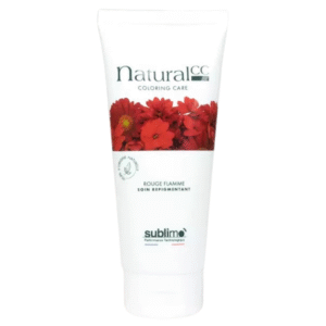 Un tube blanc étiqueté « Masque Repigmentant rouge flamme - Natural CC - 100 ml » présente des fleurs rouges et le nom de la marque « sublimo ».