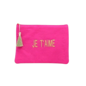Un gaze de coton trousse à maquillage rose vif "Je t'aime" avec des lettres dorées et un pompon doré sur le devant.
