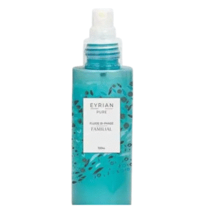 Un flacon pulvérisateur turquoise étiqueté « Fluide Bi-Phase -Eyrian - 100 ml » présente un bouchon translucide et des motifs de feuilles, idéal pour hydrater les cheveux grâce à sa formule biphasée.