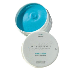 Un contenant blanc ouvert de Bubble crème 75 ml - Art & Contraste - Sublimo montre sa formule bleu vif à l'intérieur, avec le couvercle sur le côté et les détails du produit mettant en valeur cette crème capillaire fibreuse.