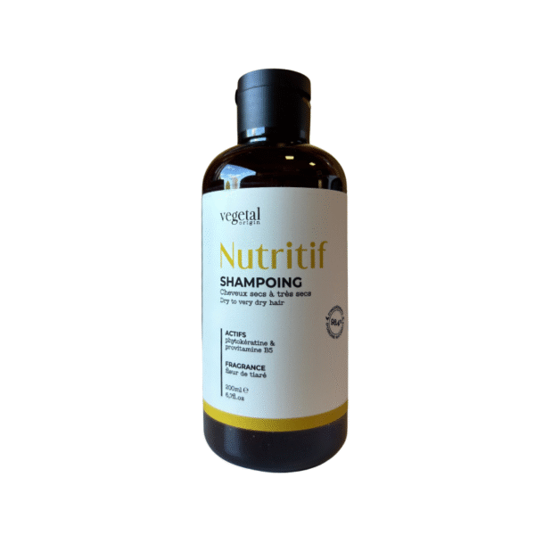 Flacon de 200 ml de Shampoing Nutritif – Cheveux très Secs pour cheveux très secs, à la Provitamine B5 et à la Vitamine B5, doté d'un bouchon noir et d'une étiquette blanche aux accents jaunes.