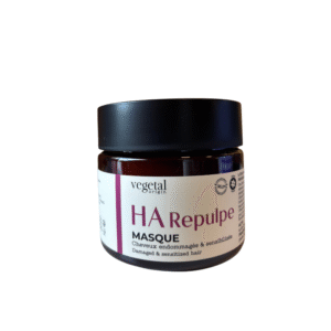 Un pot marron de Masque HA Repulpe – Cheveux très Sensibilisés 200ML avec un couvercle noir et une étiquette crème avec un texte violet et noir est le complément parfait à votre routine de shampoing gainant pour cheveux fins.