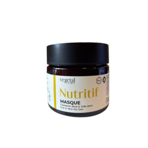 Un pot brun avec un couvercle noir étiqueté « Masque Nutritif – Cheveux très Secs 200ML », conçu pour le soin des cheveux très secs, comporte des sections blanches et jaunes avec du texte français et anglais, idéal pour définir les boucles naturelles.
