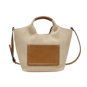 Le sac panier avec bandoulière amovible est un modèle beige bicolore en tissage, avec pompons, anse en cuir marron, grande poche frontale et bandoulière réglable en cuir marron.