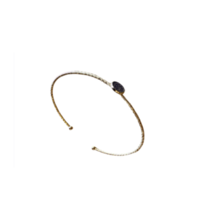 Le Bracelet jonc en acier inoxydable ou et strass noires, délicat et fin, en acier inoxydable ou et strass noires, présente un accent central ovale texturé noir, sur un fond blanc uni.