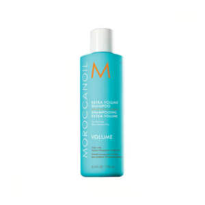 Flacon bleu de 250 ml de Shampooing Extra Volume-Moroccanoil avec un "M" orange, un texte blanc et un bouchon blanc, conçu pour donner du volume aux cheveux.